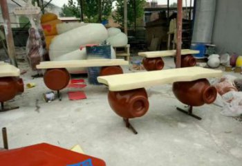 坐凳雕塑厂家，公园彩绘景观雕塑摆件