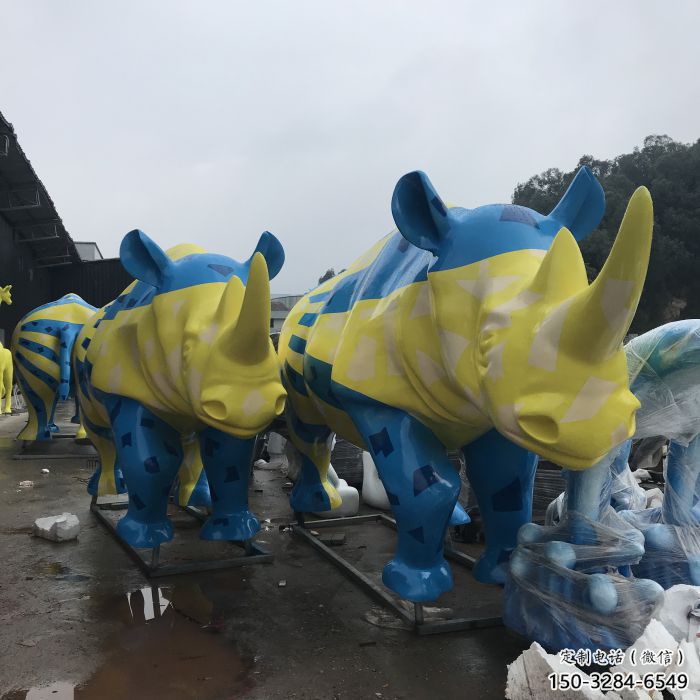 售楼部犀牛雕塑厂家,卡通景观雕塑,彩绘题材 售楼部犀牛雕塑厂家,卡通景观雕塑,彩绘题材