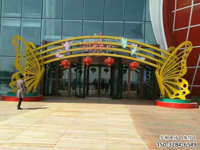 安阳蝴蝶拱门雕塑，镂空烤漆效果，不锈钢小区标识雕塑